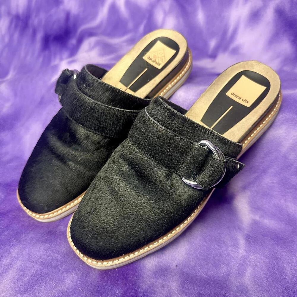 Dolce Vita cowhide, leather mules with silver D ring feature across the front.